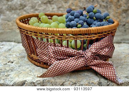 Grapes in basket with bow