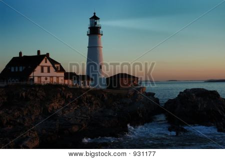 Lighthouse Shining At Dawn