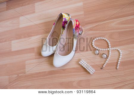 wedding shoes bracelet and earrings, a necklace
