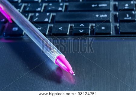 Pencil on Laptop