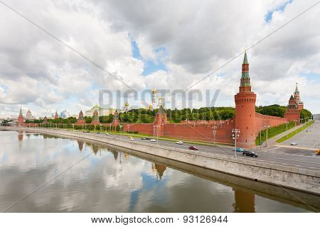 Moscow Kremlin On Moskva River Coast On Background Of Cloudy Sky
