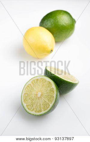 Fresh cut lime with lemon - isolated
