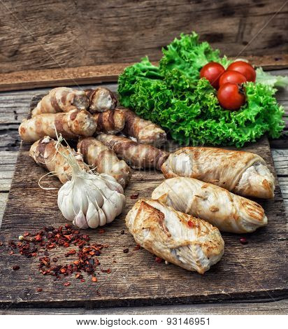 Set Fried Meat Sausages On Wooden Background