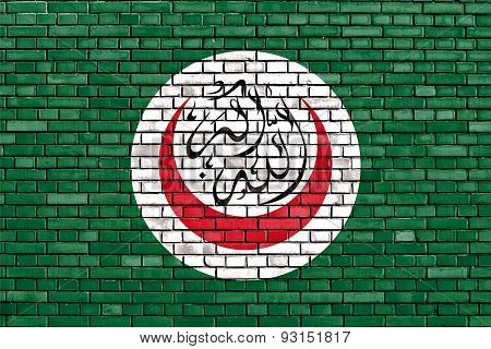 Flag Of Oic Painted On Brick Wall