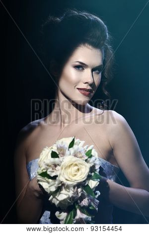 Gorgeous Brunette Bride With Wedding Bouquet.