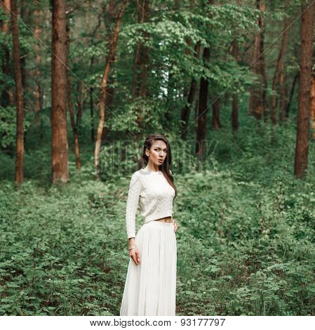 Young Pretty Woomen On Nature With Trees