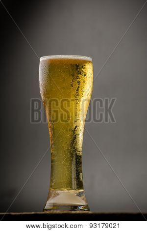 Glass Of Light Beer On Black Background
