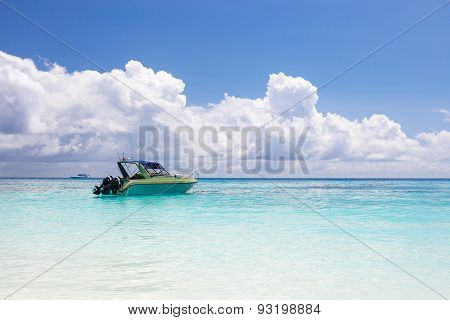 Beautiful Crystal Clear Sea And White Sand Beach With Boat At Tachai Island, Andaman, Thailand