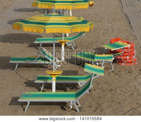 Umbrellas In Sandy Beach Seen From Above
