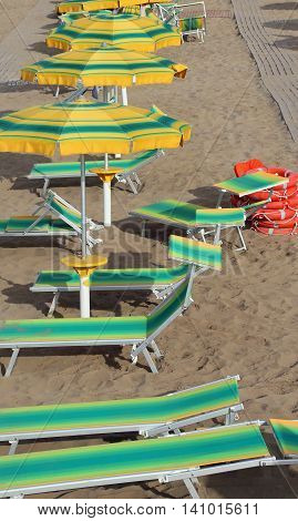 Umbrellas In Beach Seen From Above In Summer