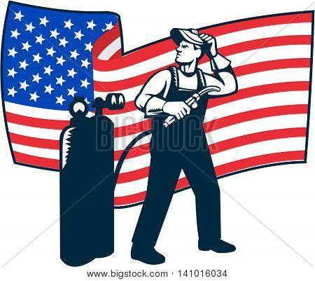 Illustration of welder worker standing with visor up looking to the side holding welding torch with tank viewed from front with usa american stars and stripes flag wavy waving in the background done in retro style.