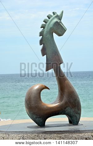 PUERTO VALLARTA MEXICO MAY 07 2016: The Good Fortune Unicorn El unicornio de la buena fortuna by the Guadalajara artist Anibal Riebeling. It's a 3 meter high unicorn