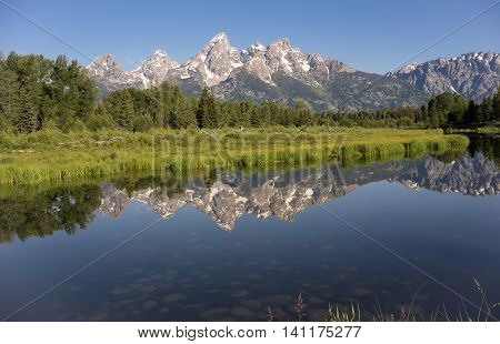 Rocky Mountain Range Reflected Smooth Water Grand Teton National Park