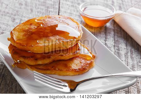 pancakes fritters carrot with maple syrup breakfast