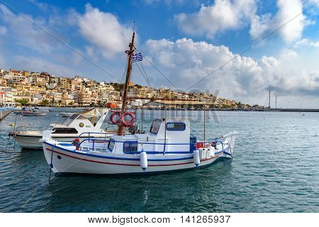 Harbour of Sitia town with parked fishing boats on Crete island, Greece