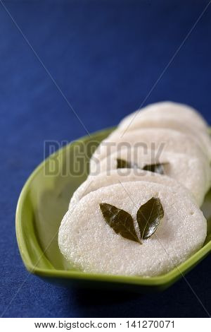 South indian cuisine vegetarian breakfast rava idli or idly in a plate.