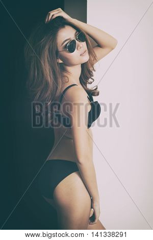A Very Sexy Asian Girl Wearing Lingerie, Posing Very Sexy.