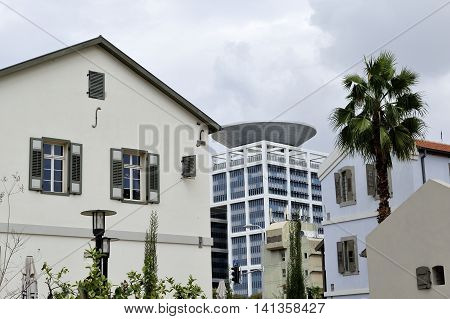 Mixed architecture buildings in Sarona district of Tel-Aviv Israel.