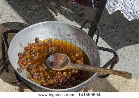 Kyustendil, Bulgaria - June 25, 2016: Feast of cherry fruit in the Kyustendil, demonstration out their production of jam, Bulgaria. Visit of Kyustendil in summer.