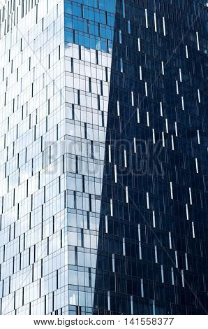 A background with the windows of a skyscraper.