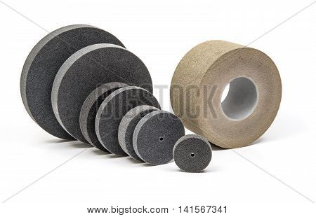 Professional Industrial grinding and polishing wheels on white background
