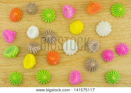 Aalaw candy, colorful Thai dessert on wood background
