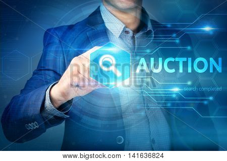 Business, Internet, Technology Concept.businessman Chooses Auction Button On A Touch Screen Interfac