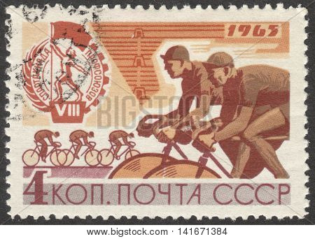 MOSCOW RUSSIA - CIRCA APRIL 2016: a post stamp printed in the USSR shows cycling the series 