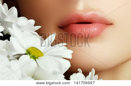 Lips With Flower. Close-up Beautiful Female Lips With Bright Lip