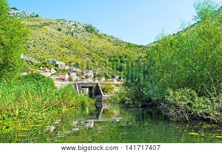The Moraca River connects the small fishing village of Vranjina with Skadar Lake Montenegro.