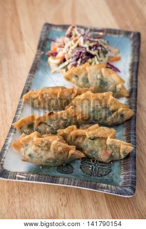 Korean Style Gyoza, Vegeterian Potstickers with soy sauce and pork