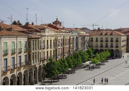 Avila, Spain - August 23, 2012: View of buildings on Plaza Santa Teresa de Jesus from medieval town walls. Castilla y Leon Spain Europe