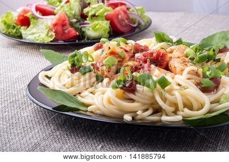 Home-cooked Meals On A Gray Mat - Pasta And Vegetable Salad
