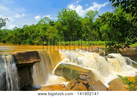 waterfalls background: Namtok Kaeng Sopha is a waterfall and tourist attraction in Wang Thong district of Phitsanulok Province in Thailand.