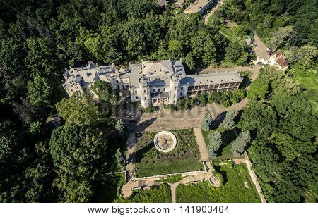 beautiful aerial view on White Swan palace and yard in Sharivka park, Kharkiv region, Ukraine