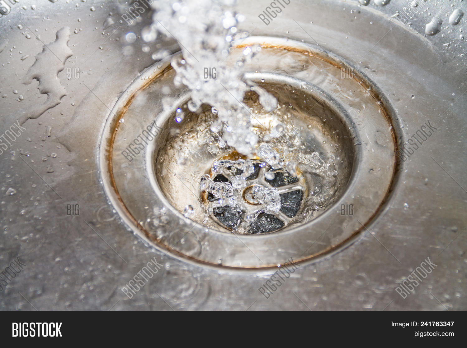 Water Drains Into Sink Image & Photo (Free Trial) Bigstock