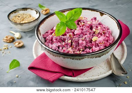Beetroot Salad With Chicken And Walnut In A Ceramic Bowl. Delicious Balanced Food Concept