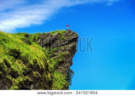 Beautiful Landscape Of Phu Chi Fa. Woman Hand Holding Umbrella At Phu Chi Fa National Park In Chiang