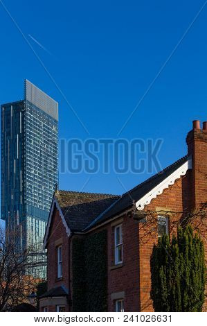 Classic Victorian Building And Modern Skyscraper In The Castlefield Area Of Manchester In The United