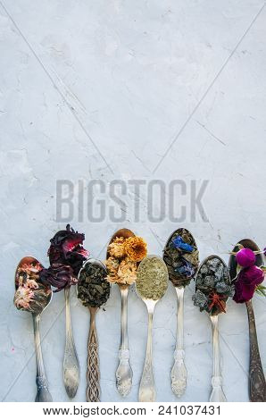 Various Flavors Of Tea. Green Tea Flower Tea Matcha Karkade In Spoons. Flat Lay.