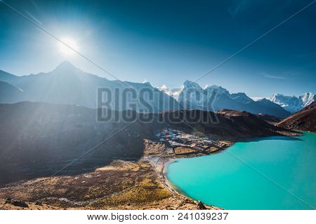 The spectacular sunset in the Himalays. Stunning panoramic view the mighty mountains and Gokyo Lake. Everest Base Camp trek in the Sagarmatha National Park in the north-eastern Nepal.