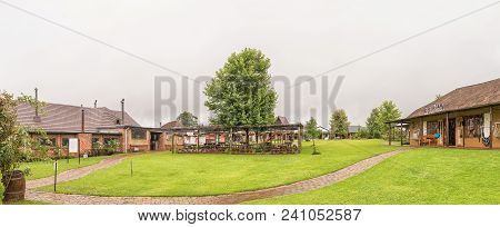 Howick, South Africa - March 22, 2018: Panorama With Businesses And Outdoor Eating Area At The Piggl