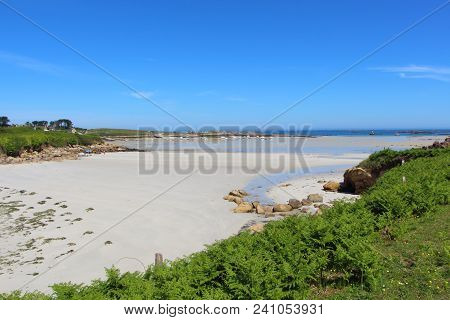 Beach And Harbor In Landunvez At Low Tide