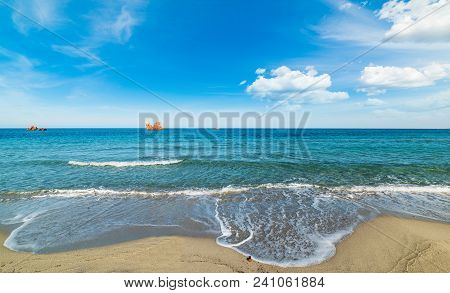 Clouds Over Cea Beach In Springtime. Sardinia, Italy