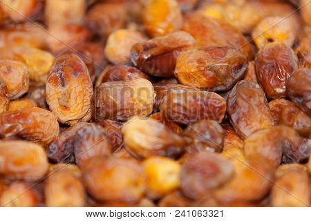 Dried Dates Fruit.  Fresh Dates Fruits Background. Close Up Dates Fruits