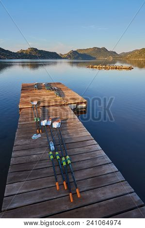 Oars For Kayaks Lie On The Dock, The Islands Of Kekova At Dawn, Turkey