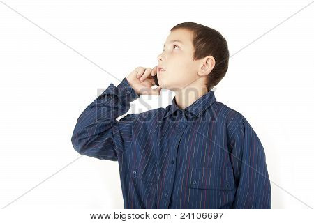 The Boy Talks By A Mobile Phone