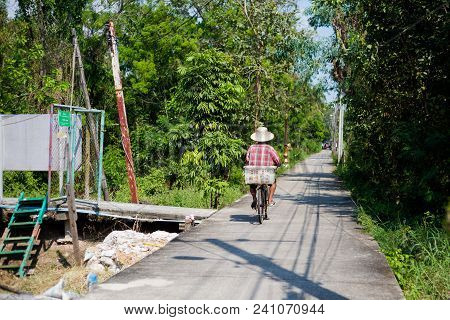 Man Local Bridge Road On Koh Kret Island On Menam River In Bangkok. Travelling Across South East Asi