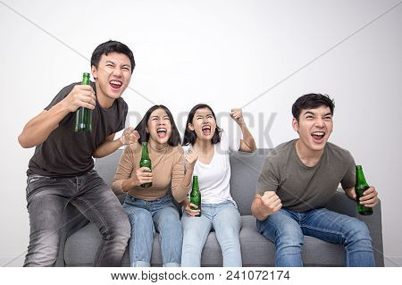 Young Asian People Watching Television Together. People Wacth World Cup Soccer With Happy Emotion. P
