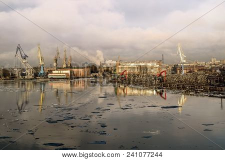 Saint-petersburg.russia.6 April 2018. Cranes  And Ships In The Marine Cargo Port Of Saint-petersburg